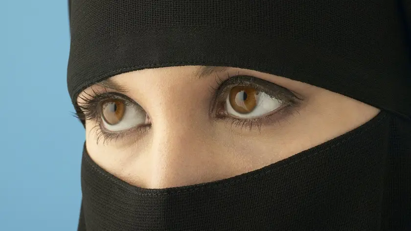 Muslim Woman with Veiled Hair and Face --- Image by © Corbis