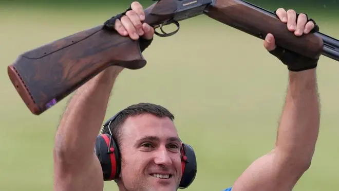 epa03345317 Giovanni Cernogoraz of Croatia celebrates winning the gold medal in the men's Trap final at the Royal Artillery Barracks in the London 2012 Olympic Games 06 August 2012. EPA/Lindsey Parnaby