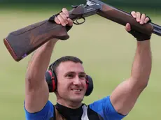 epa03345317 Giovanni Cernogoraz of Croatia celebrates winning the gold medal in the men's Trap final at the Royal Artillery Barracks in the London 2012 Olympic Games 06 August 2012. EPA/Lindsey Parnaby