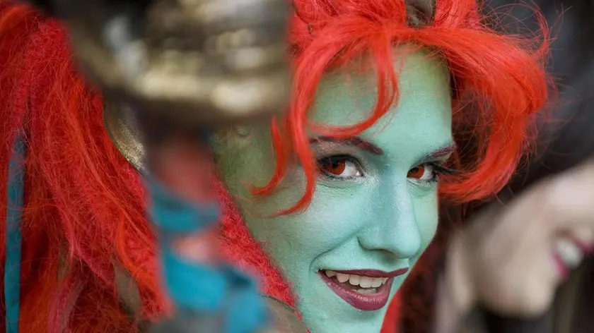 21 Oct 2011, Anaheim, California, USA --- Oct. 21, 2011 - Anaheim, California, U.S. - Cosplayer Kait Culpepper, 23, of Atlanta, dressed as a Troll Death Night used red contact lenses for her eyes to complete her costume for BlizzCon 2011 at the Anaheim Convention Center. (Credit Image: © Leonard Ortiz/The Orange County Register) --- Image by © Leonard Ortiz/ZUMA Press/Corbis