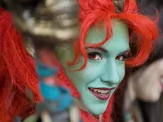 21 Oct 2011, Anaheim, California, USA --- Oct. 21, 2011 - Anaheim, California, U.S. - Cosplayer Kait Culpepper, 23, of Atlanta, dressed as a Troll Death Night used red contact lenses for her eyes to complete her costume for BlizzCon 2011 at the Anaheim Convention Center. (Credit Image: © Leonard Ortiz/The Orange County Register) --- Image by © Leonard Ortiz/ZUMA Press/Corbis