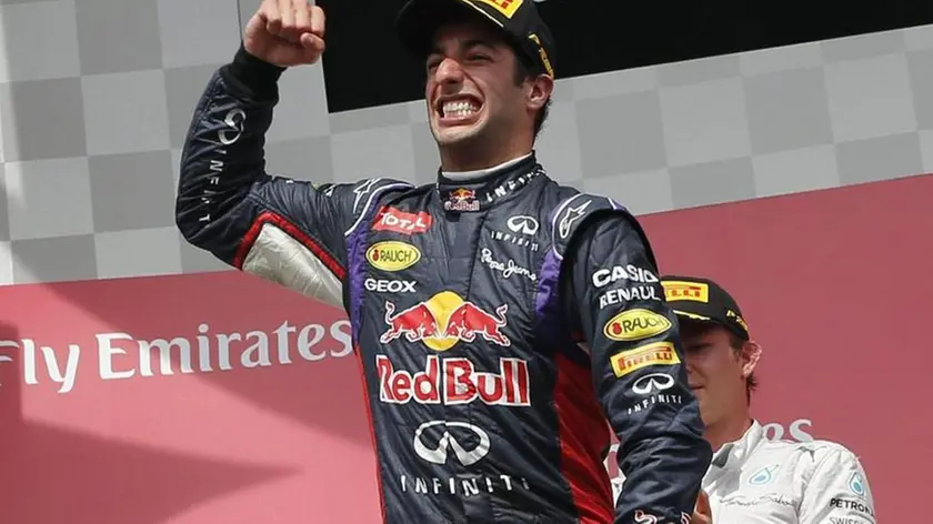 epa04245580 Winner Australian Formula One driver Daniel Ricciardo of Red Bull Racing celebrates on the podium after the 2014 Formula One Grand Prix of Canada at the Gilles Villeneuve circuit in Montreal, Canada, 08 June 2014. EPA/VALDRIN XHEMAJ
