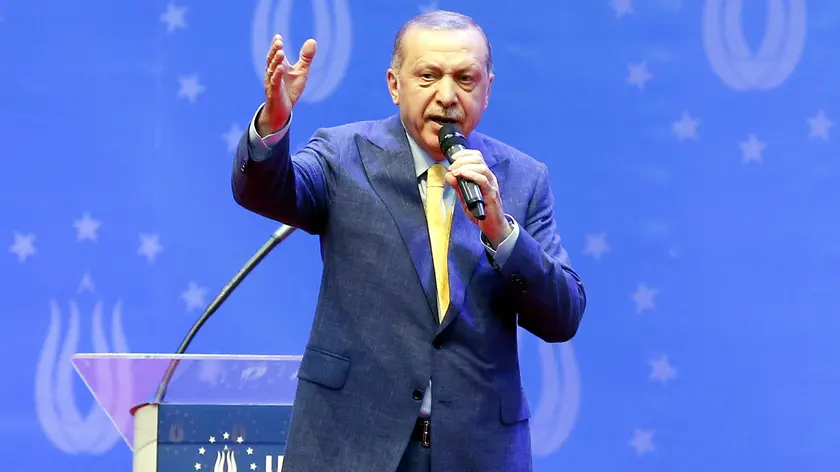 epa06752883 Turkish President Recep Tayyip Erdogan speaks during an election campaign rally of his Justice and Development Party (AK Party) in Sarajevo, Bosnia and Herzegovina, 20 May 2018. Some 10,000 supporters gathered to attend the AKP's rally ahead of the 24 June snap elections in Turkey. The presidential and parliamentary elections were originally scheduled to be held in November 2019, but government has decided the change the date. About three million Turks living abroad are eligible to vote in the election. EPA/FEHIM DEMIR