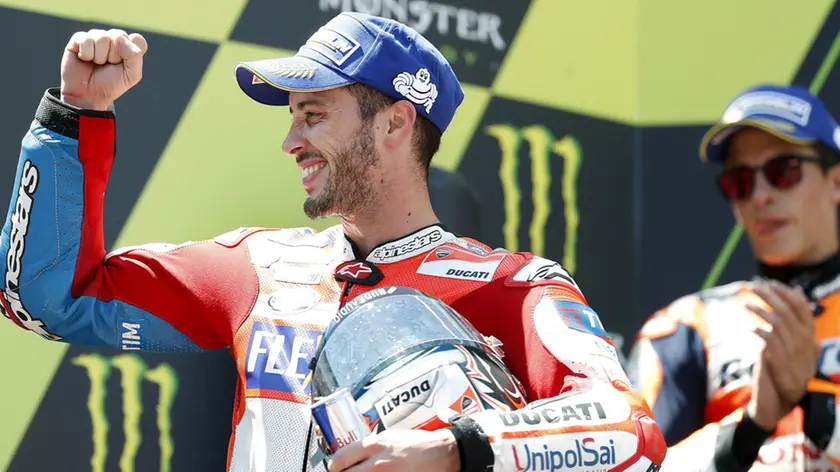 Italian MotoGP pilot Andrea Dovizioso of Ducati celebrates his victory at the podium of the Catalonia Motorcycle Grand Prix held at the racetrack of Montmelo in Barcelona, northeastern Spain, 11 June 2017. EFE/Andreu Dalmau