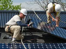 21 May 2010, Boulder, Colorado, USA --- Solar panel installation, Boulder, Colorado. --- Image by © Topher Donahue/Aurora Photos/Corbis