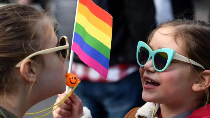 epaselect epa07173547 Montenegrin children take part in a Lesbian, Gay, Bisexual and Transgender (LGBT) Pride march in Podgorica, Montenegro, 17 November 2018. The organizers say that this year's LGBT pride will be held ahead of the adoption of the law on same-sex registered partnerships. Hundreds of gay activists and supporters marched in the streets of Podgorica demanding more rights. LGBT rights are a controversial issue in Montenegro and elsewhere in the Balkan region, where society is considered conservative. Montenegro's first LGBT pride in July 2013 ended with police warning shots fired in the air to expel anti-gay nationalists who stoned and beat participants. EPA/BORIS PEJOVIC