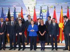 epa07537014 French President Emmanuel Macron (C-L), German Chancellor Angela Merke (C), Federica Mogherini (C-R) High Representative of the European Union for Foreign Affairs and Security Policy, join with other leaders for the family photo (group photo) of the participants at the end of the Western Balkan Conference at the Chancellery in Berlin, Germany, 29 April 2019. German Chancellor Angela Merkel and French President Emmanuel Macron are hosting a meeting of European Union officials and Western Balkan leaders to restart talks between Serbia and Kosovo. EPA/Mika Schmidt / POOL