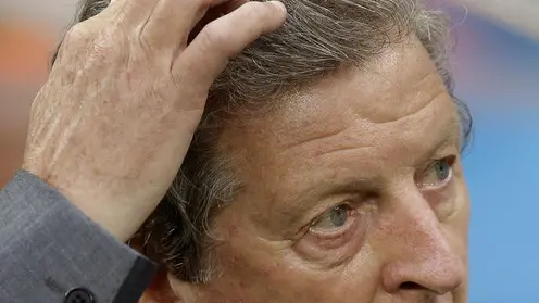 England's manager Roy Hodgson touches his head before the group D World Cup soccer match between England and Italy at the Arena da Amazonia in Manaus, Brazil, Saturday, June 14, 2014. (AP Photo/Matt Dunham)