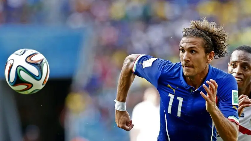 epa04269457 Junior Diaz (R) of Costa Rica in action against Alessio Cerci (L) of Italy during the FIFA World Cup 2014 group D preliminary round match between Italy and Costa Rica at the Arena Pernambuco in Recife, Brazil, 20 June 2014. Costa Rica won 1-0. (RESTRICTIONS APPLY: Editorial Use Only, not used in association with any commercial entity - Images must not be used in any form of alert service or push service of any kind including via mobile alert services, downloads to mobile devices or MMS messaging - Images must appear as still images and must not emulate match action video footage - No alteration is made to, and no text or image is superimposed over, any published image which: (a) intentionally obscures or removes a sponsor identification image; or (b) adds or overlays the commercial identification of any third party which is not officially associated with the FIFA World Cup) EPA/CHEMA MOYA EDITORIAL USE ONLY