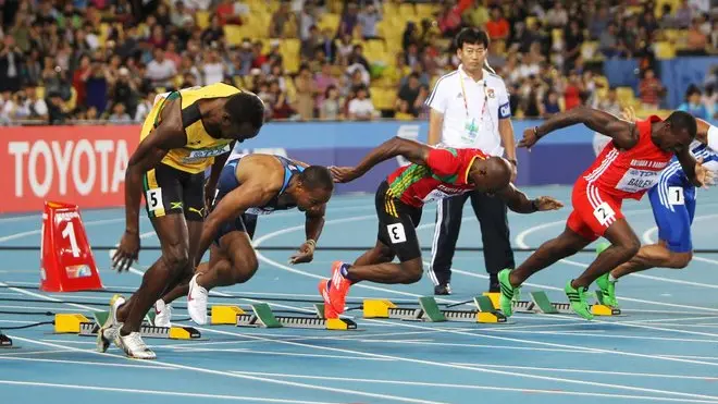 epa02885130 Usain Bolt (2nd L) of Jamaica makes a false start in the men's 100m final at the 13th IAAF World Championships in Daegu, Republic of Korea, 28 August 2011. The defending champion and world record holder was disqualified from the final. EPA/RUNGROJ YONGRIT
