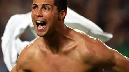 Real Madrid's Cristiano Ronaldo celebrates after scoring the 4-1 lead from the penalty spot during the UEFA Champions League final between Real Madrid and Atletico Madrid at Luz stadium in Lisbon, Portugal, 24 May 2014. ANSA/JOSE SENA GOULAO