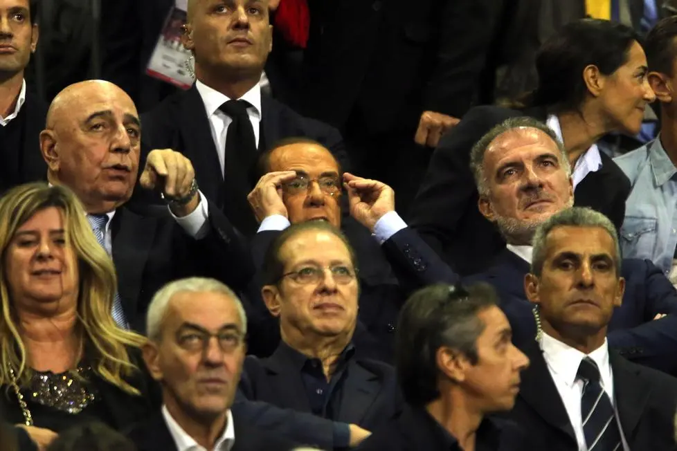 Silvio Berlusconi, nuovo propietario della società di calcio Brianzola, in tribuna allo stadio Brianteo. Al suo fianco Adriano Galliani. Monza, 14 ottobre 2018. ANSA/RADAELLI
