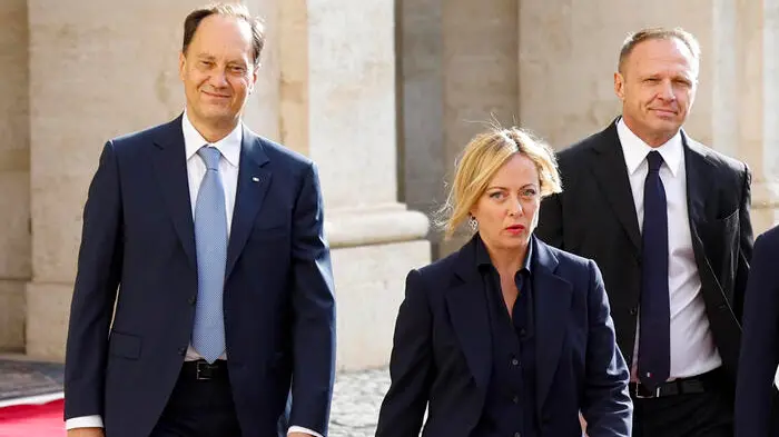 Leader of ‘Fratelli d'Italia’ party Giorgia Meloni (C) arrives for a meeting with Italian President Sergio Mattarella for the first round of formal political consultations for new government at the Quirinale Palace in Rome, Italy, 21 October 2022. ANSA/FABIO FRUSTACI