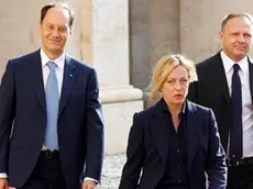 Leader of ‘Fratelli d'Italia’ party Giorgia Meloni (C) arrives for a meeting with Italian President Sergio Mattarella for the first round of formal political consultations for new government at the Quirinale Palace in Rome, Italy, 21 October 2022. ANSA/FABIO FRUSTACI