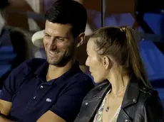 epa08485565 Novak Djokovic (L) of Serbia with his wife Jelena (R) watch the final match between Filip Krajinovic of Serbia and Dominic Thiem of Austria at the Adria Tour tennis tournament in Belgrade, Serbia, 14 June 2020. The Adria Tour will be held until 05 July in a number of Balkan countries. EPA/ANDREJ CUKIC