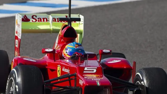 epa03099799 Spanish Formula One driver Fernando Alonso of Ferrari Team steers his F2012 during the third training session to prepare the Formula One season at Jerez racetrack in Jerez de la Frontera, southern Spain, on 10 February 2012. EPA/JULIO MUNOZ