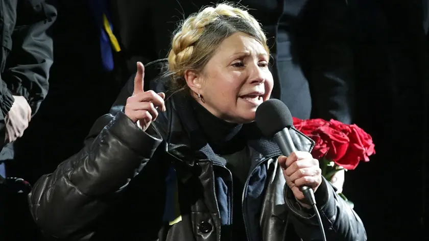 epa04096563 Ukrainian opposition leader Yulia Tymoshenko speaks during a rally in Kiev Ukraine, 22 February 201Former Ukrainian Prime Minister Yulia Tymoshenko on 22 February appeared on the stage of Kiev's Independence Square, or Maidan, hours after being released from prison. Tymoshenko, who was in a wheelchair, first praised the protesters and those who were killed during last week's unrest. 'The heroes never die' she said with a tearful voice. The Square was packed with tens of thousands of people. The former Ukrainian Prime Minister, who was sentenced to seven years in jail for abuse of office in 2011, earlier said she will stand for president in May, the Itar-Tass news agency reported. The Ukrainian parliament on 22 February set early presidential elections for 25 May 2014. EPA/MAXIM SHIPENKOV