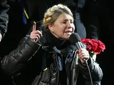 epa04096563 Ukrainian opposition leader Yulia Tymoshenko speaks during a rally in Kiev Ukraine, 22 February 201Former Ukrainian Prime Minister Yulia Tymoshenko on 22 February appeared on the stage of Kiev's Independence Square, or Maidan, hours after being released from prison. Tymoshenko, who was in a wheelchair, first praised the protesters and those who were killed during last week's unrest. 'The heroes never die' she said with a tearful voice. The Square was packed with tens of thousands of people. The former Ukrainian Prime Minister, who was sentenced to seven years in jail for abuse of office in 2011, earlier said she will stand for president in May, the Itar-Tass news agency reported. The Ukrainian parliament on 22 February set early presidential elections for 25 May 2014. EPA/MAXIM SHIPENKOV