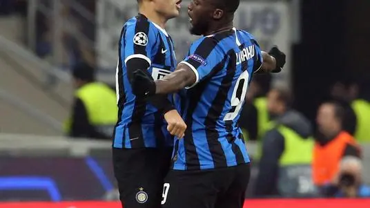 Inter's Romelu Lukaku (R) jubilates with his teammate Lautaro Martinez after scoring the goal during the UEFA Champions League group F soccer match Inter FC vs FC Barcelona at the Giuseppe Meazza stadium in Milan, Italy, 10 December 2019. ANSA/MATTEO BAZZI