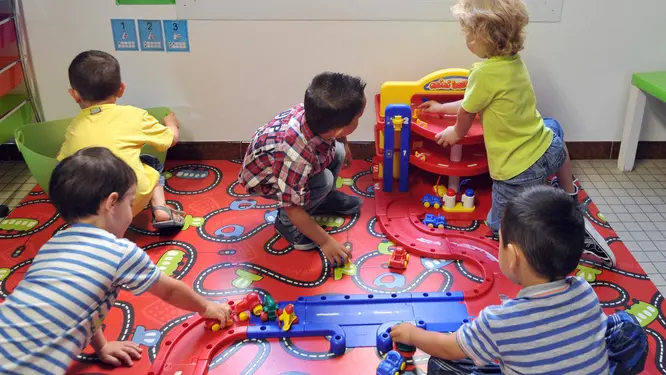 Children play in a classroom of the Notre-Dame de la Sagesse private nursery school at an early start of a new school year on August 27, 2012 in Nantes, western France. AFP PHOTO FRANK PERRY (Photo credit should read FRANK PERRY/AFP/GettyImages)