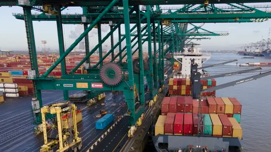 epa08986757 A container ship is unloaded at Antwerp Harbour, in Antwerp, Belgium, 04 February 2021. Due to the coronavirus pandemic, the average price for a container has almost quadrupled in a year. Global trade flows slowed down as a result, and shipping companies reduced their capacity. A lot of containers are now in Europe and not available in Asia. Antwerp is the second larges port of importation in Europe, after Rotterdam by total freight shipped. EPA/OLIVIER HOSLET