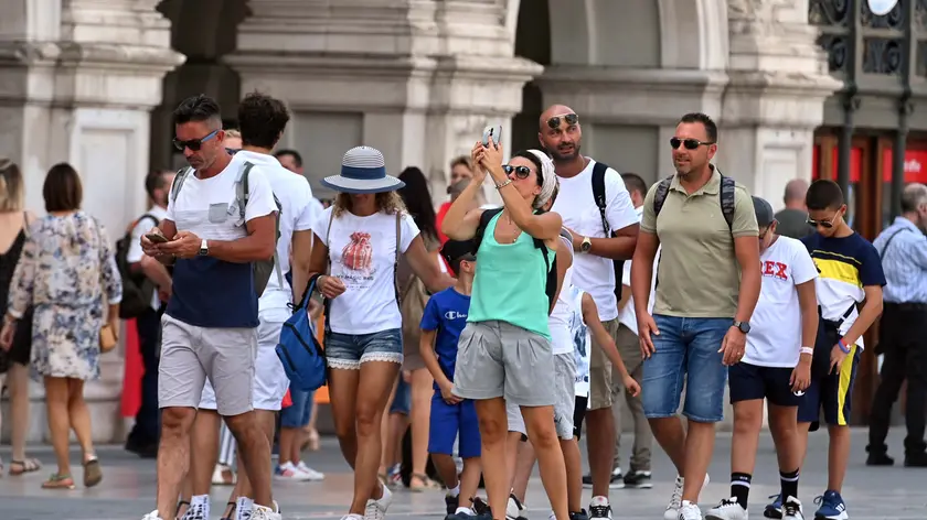 Turisti a Trieste in una foto di repertorio (Bruni)