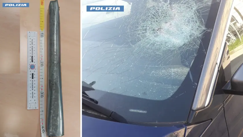 La spranga sequestrata e una delle auto danneggiate
