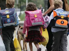 BERLIN - AUGUST 23: Children walk down the way on the first school day on August 23, 2010 in Berlin, Germany. Many German school districts, including those in Berlin, are reducing the school times pan from 13 to 12 years as part of a nationwide set of primary and secondary school reforms.. (Photo by Andreas Rentz/Getty Images)