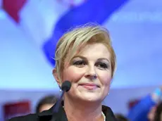 epa04541816 Presidential candidate of Croatian Democratic Union (HDZ) Kolinda Grabar-Kitarovic gives her speech after first results of Presidential elections in Zagreb, Croatia, 28 December 2014. Kitarovic will face current President Ivo Josipovic on the second round of the Presidential elections scheduled for 11 January 2015. EPA/STR