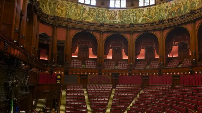 A view of the hemicycle inside Italy\'s Lower Chamber Montecitorio Palace, in Rome, Wednesday, Sept. 16, 2020. Italians will vote in a national referendum next Sept. 20 and 21 to say if they want to reduce from 630 to 400 in the Chamber of Deputies and from 315 to 200 in the Senate the number of representatives. (AP Photo/Andrew Medichini)