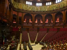 A view of the hemicycle inside Italy\'s Lower Chamber Montecitorio Palace, in Rome, Wednesday, Sept. 16, 2020. Italians will vote in a national referendum next Sept. 20 and 21 to say if they want to reduce from 630 to 400 in the Chamber of Deputies and from 315 to 200 in the Senate the number of representatives. (AP Photo/Andrew Medichini)