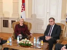 03 Mar 2015 --- (150303) -- SARAJEVO, March 3, 2015 (Xinhua) -- Visiting Croatian Presidenct Kolinda Grabar-Kitarovic (2nd L) meets members of Presidency of Bosnia and Herzegovina (BiH) Bakir Izetbegovic (R), Dragan Covic (L) and Chairman of Presidency Mladen Ivanic (2nd R), on March 3, 2015, in Sarajevo, BiH. (Xinhua/Haris Memija) --- Image by © Haris Memija/Xinhua Press/Corbis