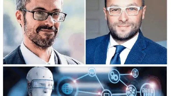 I due coordinatori di UniTs Francesco Pauli e Guido Bortoluzzi, sotto l’illustrazione di un robot