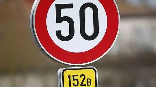 A street sign marks the beginning of the village of Schengen, Luxembourg January 27, 2016. The Schengen Agreement with the goal to eliminate internal border controls was signed on June 14, 1985 in the small village at the river Moselle and the tripoint of France, Germany and Luxembourg between the five countries of Belgium, France, Germany, Luxembourg and the Netherlands. European Union interior ministers are to discuss extending temporary border controls in the passport-free Schengen zone to control migration flows, as well as identity document fraud following France's request to improve the detection of fake Syrian passports used by people trying to get into Europe. REUTERS/Wolfgang Rattay