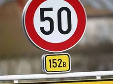 A street sign marks the beginning of the village of Schengen, Luxembourg January 27, 2016. The Schengen Agreement with the goal to eliminate internal border controls was signed on June 14, 1985 in the small village at the river Moselle and the tripoint of France, Germany and Luxembourg between the five countries of Belgium, France, Germany, Luxembourg and the Netherlands. European Union interior ministers are to discuss extending temporary border controls in the passport-free Schengen zone to control migration flows, as well as identity document fraud following France's request to improve the detection of fake Syrian passports used by people trying to get into Europe. REUTERS/Wolfgang Rattay