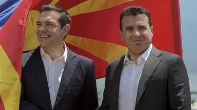 epa06815071 Greek Prime Minister Alexis Tsipras (L) and FYROM Prime Minister Zoran Zaev (R) shake hands after their arrival on Macedonian side of the Lake Prespa, near Otesevo, the Former Yugoslav Republic of Macedonia (FYROM), 17 June 2018. Prime Ministers from Greece and Macedonia meet in the Prespes lake district, that borders both countries, and sign an agreement aimed at ending a decades-long dispute between their countries. The agreement shall lead to the renaming of Greece's northern neighbour, as well as its EU and NATO entry. EPA/NAKE BATEV