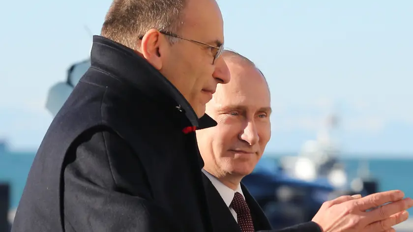 26/11/2013 Trieste, Italia Vertice intergovernativo Italia-Russia..Nella foto (s) il presidente del Consiglio dei ministri, Enrico Letta e il presidente della Federazione Russa, Vladimir Putin Enrico Letta, Vladimir Putin..Pierre Teyssot / AGF