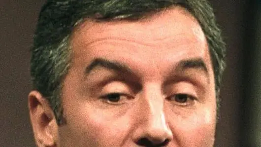 BEL01 - 20030108 - PODGORICA - POL - MONTENEGRO: VIA LIBERA PARLAMENTO A NUOVO GOVERNO - Montenegro's Prime Minister Milo Djukanovic gestures during his speech in parliament on Wednesday, 08 January 2003, in Podgorica. Montenegro's parliament elected a new cabinet Wednesday with veteran leader and former president Milo Djukanovic as prime minister. ANSA / SASA MARICIC / SM / TO