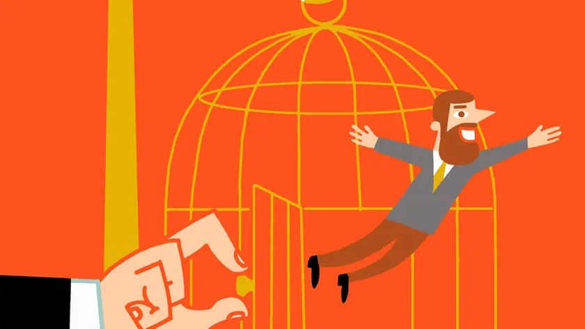 Hand releasing man from birdcage