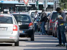 Ambulanti-parcheggiatori sulle Rive in una foto di repertorio. Massimo Silvano