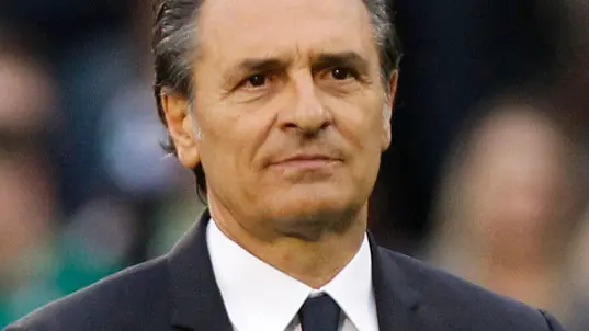 Italy's head coach Cesare Prandelli arrives at the dugout before the start of their international friendly soccer match against Republic of Ireland at Craven Cottage, London, Saturday, May 31, 2014. (AP Photo/Sang Tan)