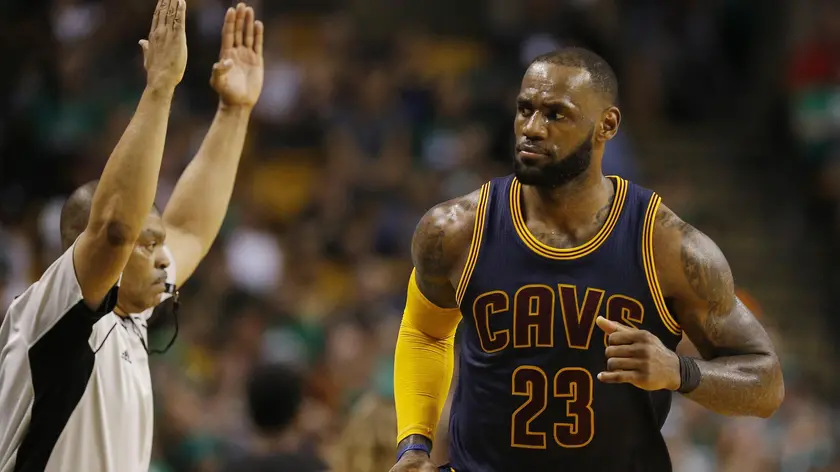 epa05975544 Cleveland Cavaliers forward LeBron James after a three-pointer against the Boston Celtics during the second half of their NBA Eastern Conference Final game two at the TD Garden in Boston, Massachusetts, USA, 19 May 2017. The winner of the best-of-seven series will go on to face either the San Antonio Spurs or the Golden State Warriors in the NBA Finals. EPA/CJ GUNTHER