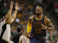 epa05975544 Cleveland Cavaliers forward LeBron James after a three-pointer against the Boston Celtics during the second half of their NBA Eastern Conference Final game two at the TD Garden in Boston, Massachusetts, USA, 19 May 2017. The winner of the best-of-seven series will go on to face either the San Antonio Spurs or the Golden State Warriors in the NBA Finals. EPA/CJ GUNTHER