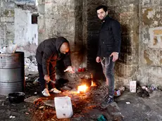 Migranti all'ex Silos di Trieste (foto Massimo Silvano)