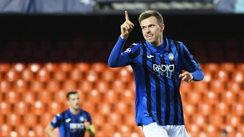 epa08284694 A handout image provided by UEFA shows Josip Ilicic of Atalanta celebrating a goal during the UEFA Champions League round of 16 second leg match between Valencia CF and Atalanta BC at Estadio Mestalla in Valencia, Spain, 10 March 2020. The match takes place behind closed doors due to the coronavirus (COVID-19) outbreak. EPA/UEFA / HO **SHUTTERSTOCK OUT** HANDOUT NO SALES/NO ARCHIVES