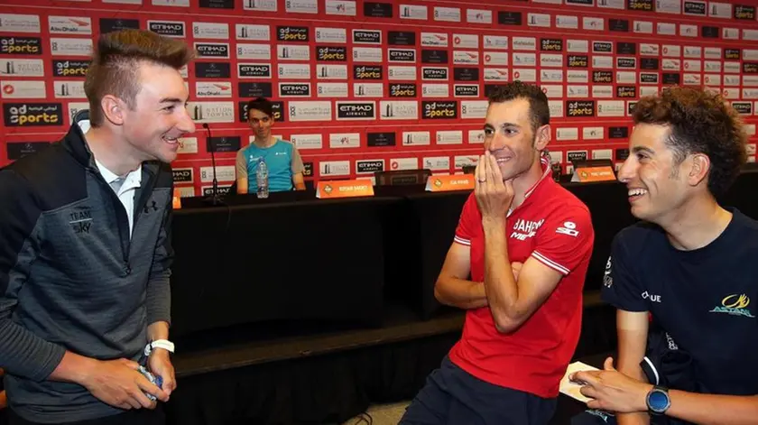 Elia Vitali (L) of Team Sky speaks with Fabio Aru (R) of Astana pro Team and Vincenzi Nibali Bahrain Meridaat the Yas Marina Circuit in Abu Dhabi, UAE, 22 February 2017. The Abu Dhabi tour runs from 23-26 February The Abu Dhabi tour runs from 23 to 26 of February 2017. ANSA / MATTEO BAZZI