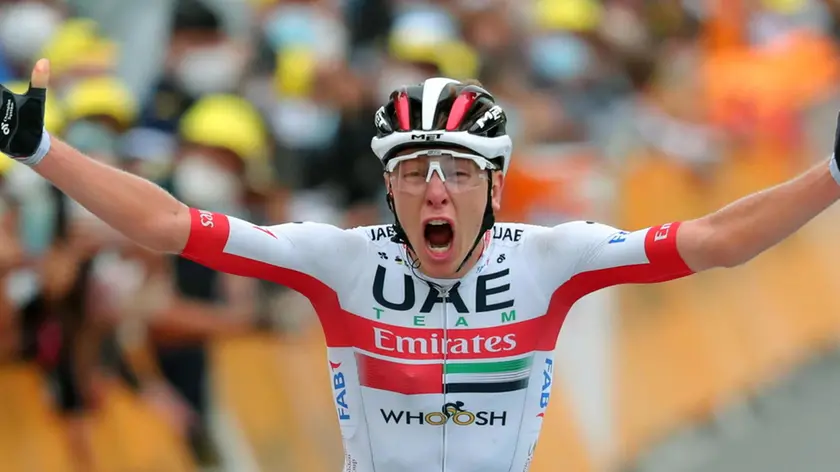 epa08650694 Slovenian rider Tadej Pogacar of UAE-Team Emirates wins the 9th stage of the Tour de France over 153km from Pau to Laruns, France, 06 September 2020. EPA/Thibault Camus / Pool