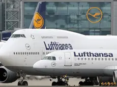 (FILE) A file photo dated 23 March 2009 showing passenger planes of German carrier Lufthansa waiting for take-off clearance at the airport in Frankfurt Main, Germany. EPA/BORIS ROESSLER