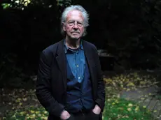 epa07910653 Austrian writer Peter Handke poses for photographs at his home in Chaville, near Paris, France, 10 October 2019. The Nobel Prize in Literature for 2019 is awarded to Peter Handke, the Swedish Academy announced on 10 October 2019. EPA/JULIEN DE ROSA