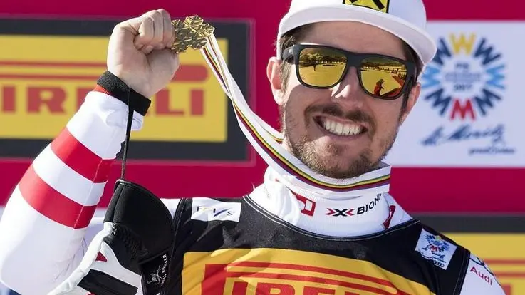 epa05803824 Gold medalist Marcel Hirscher of Austria, celebrates during the award ceremony of the Men's Slalom race at the 2017 FIS Alpine Skiing World Championships in St. Moritz, Switzerland, 19 February 2017. EPA/PETER SCHNEIDER